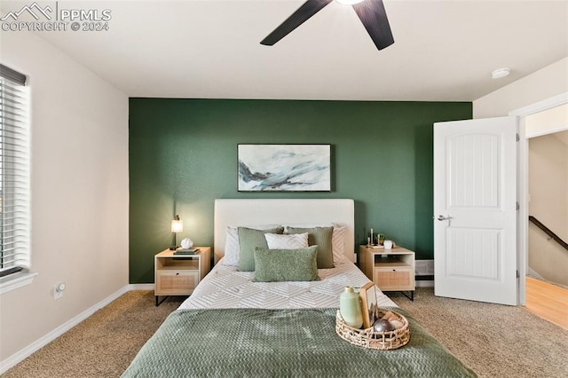 bedroom with ceiling fan and carpet