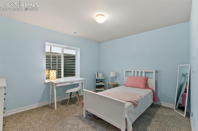 bedroom featuring carpet flooring