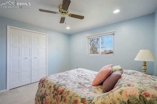 bedroom featuring light carpet, ceiling fan, a closet, and recessed lighting