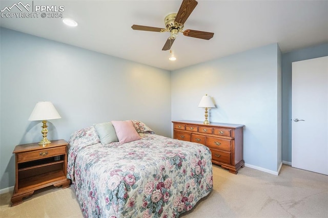 bedroom featuring light carpet, ceiling fan, recessed lighting, and baseboards