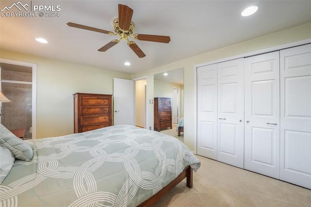 bedroom featuring recessed lighting, a closet, light carpet, ceiling fan, and ensuite bath