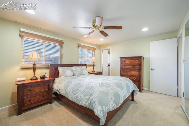 bedroom featuring baseboards, recessed lighting, a ceiling fan, and light colored carpet