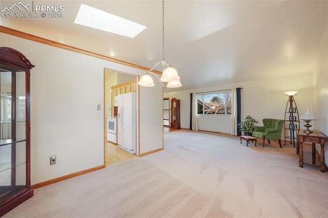 living area featuring light carpet, a skylight, and baseboards