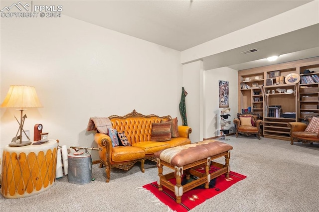 living room with built in features and carpet floors