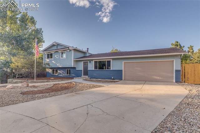 split level home with a garage