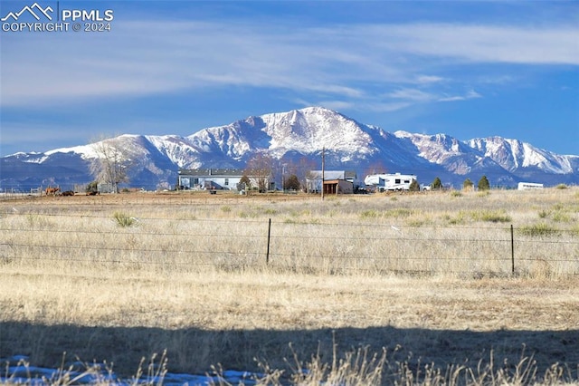 property view of mountains featuring a rural view