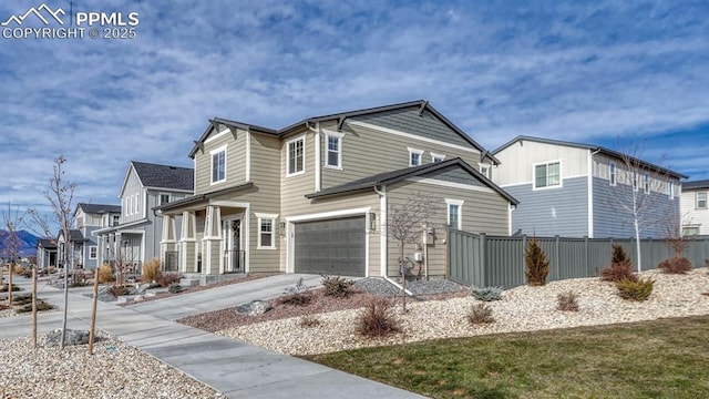 view of front of home with a front lawn and a garage