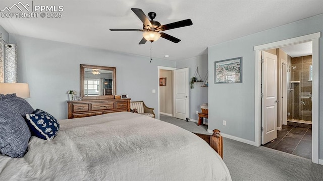 bedroom featuring ceiling fan, dark tile patterned floors, and ensuite bath