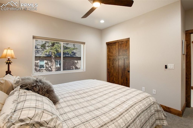 carpeted bedroom featuring ceiling fan