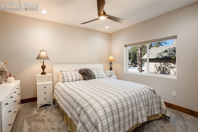 carpeted bedroom featuring ceiling fan