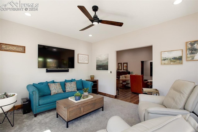 living room featuring ceiling fan