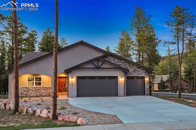 view of front of home with a garage