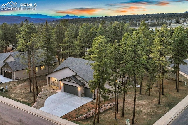 aerial view at dusk with a mountain view