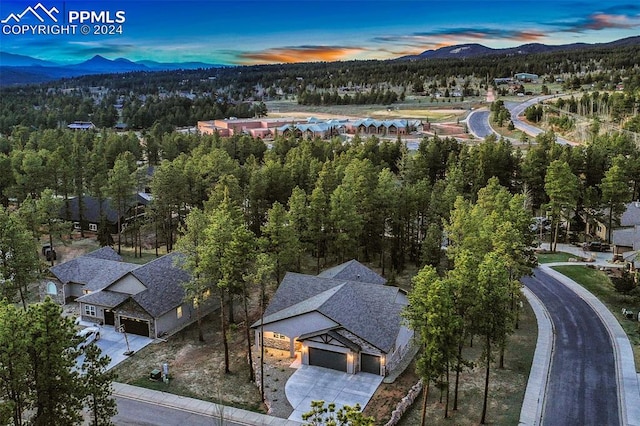 aerial view at dusk with a mountain view