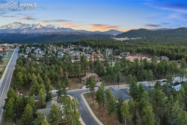 aerial view at dusk with a mountain view