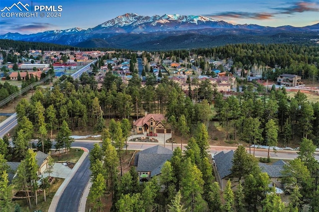 aerial view at dusk with a mountain view