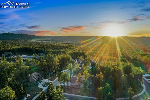 aerial view at dusk with a mountain view