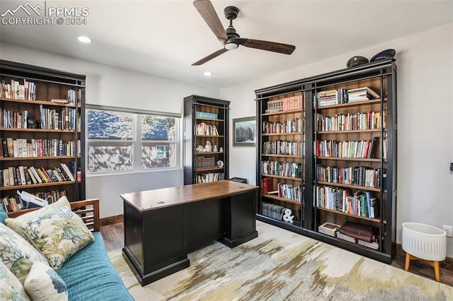 office area with ceiling fan and light hardwood / wood-style flooring