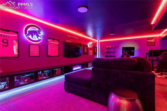 home theater featuring carpet flooring