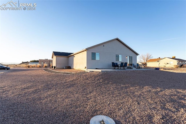 view of home's exterior featuring a patio area