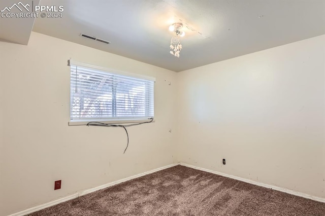 empty room featuring carpet floors