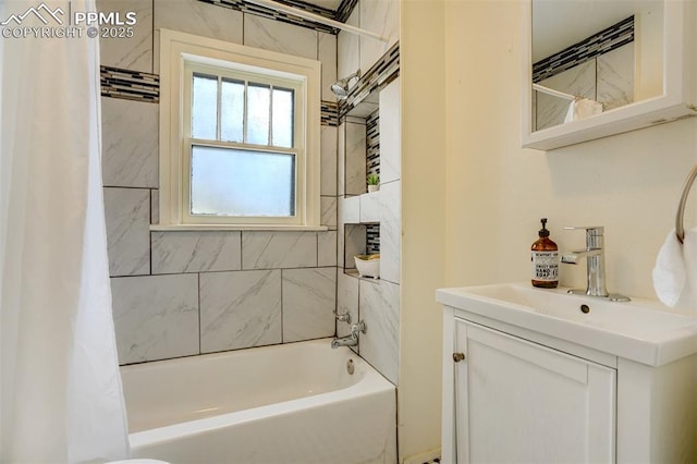 bathroom featuring shower / bath combination with curtain and vanity