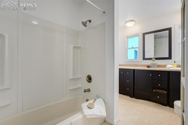 full bathroom featuring shower / bathing tub combination, vanity, and toilet