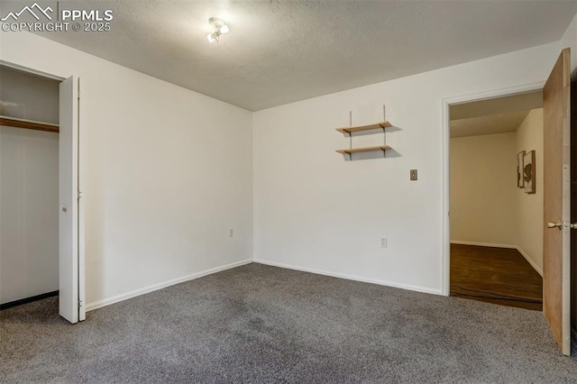 unfurnished bedroom with carpet floors and a closet