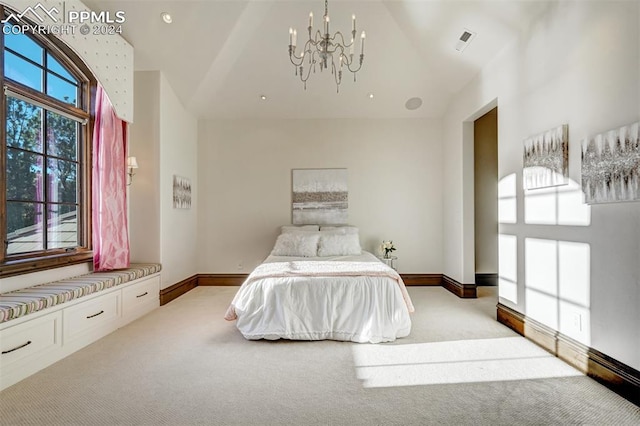 carpeted bedroom with a notable chandelier and high vaulted ceiling