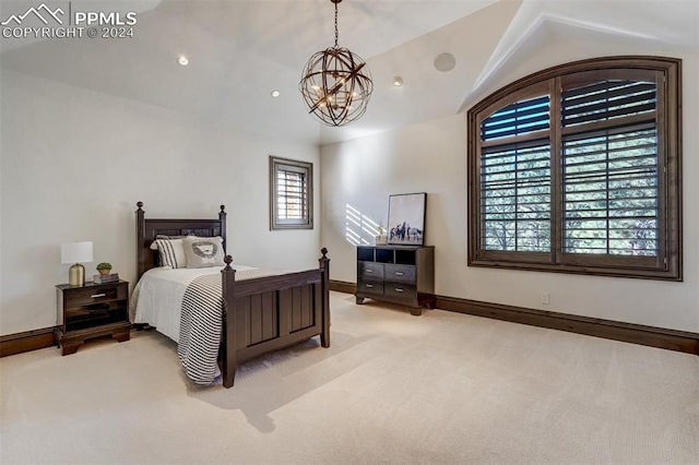 carpeted bedroom with a chandelier and vaulted ceiling