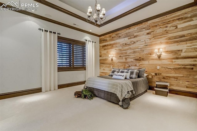 carpeted bedroom featuring a chandelier, wooden walls, and ornamental molding