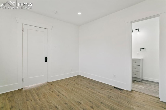 empty room with light wood-type flooring