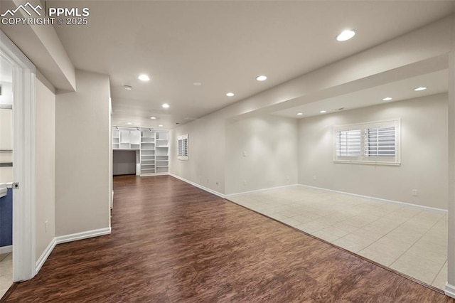 unfurnished living room with tile patterned floors