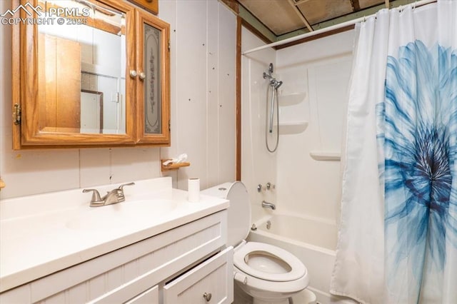 full bathroom featuring vanity, toilet, and shower / tub combo with curtain