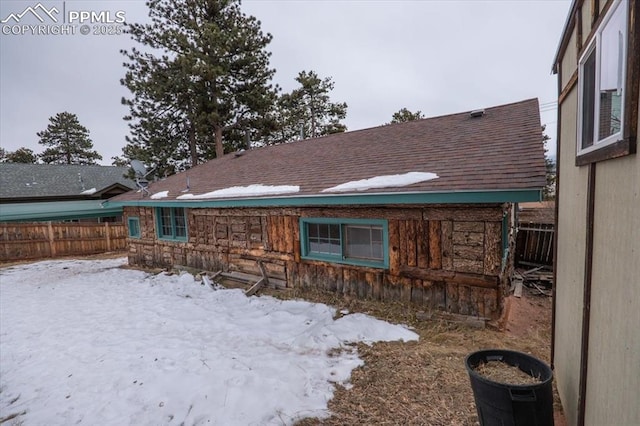 view of snow covered property