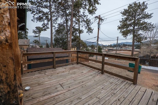 wooden terrace with a mountain view