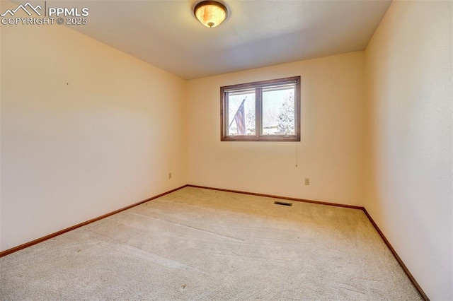 view of carpeted spare room