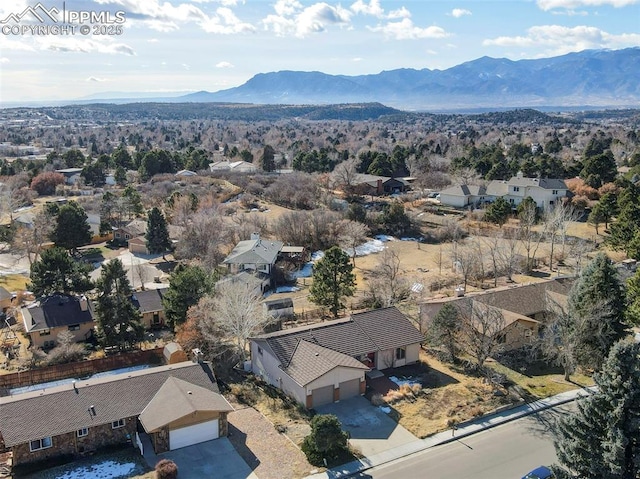 drone / aerial view featuring a mountain view