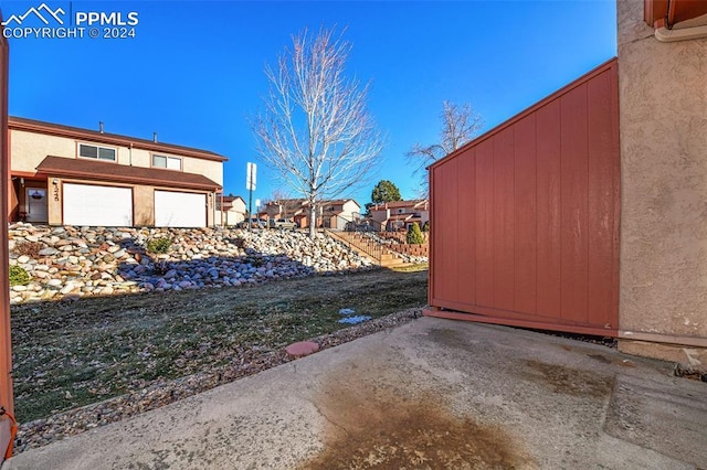 view of yard featuring a garage