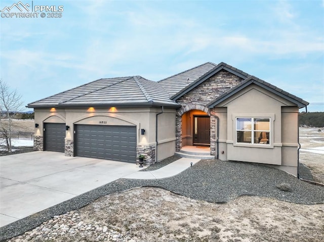 view of front of home with a garage