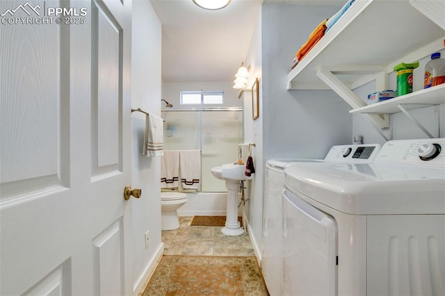 washroom featuring separate washer and dryer