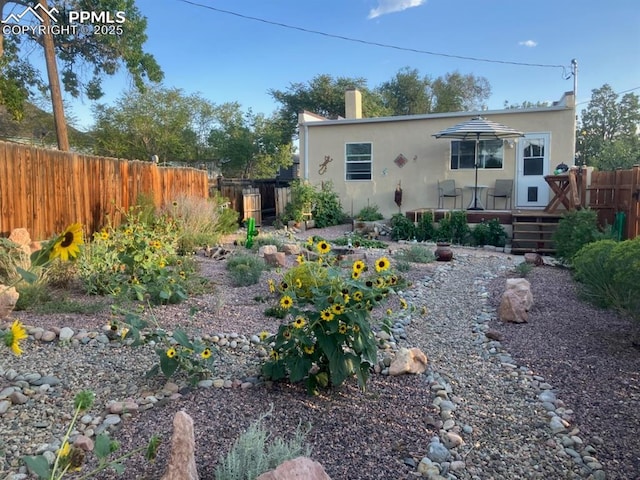 view of yard featuring a wooden deck