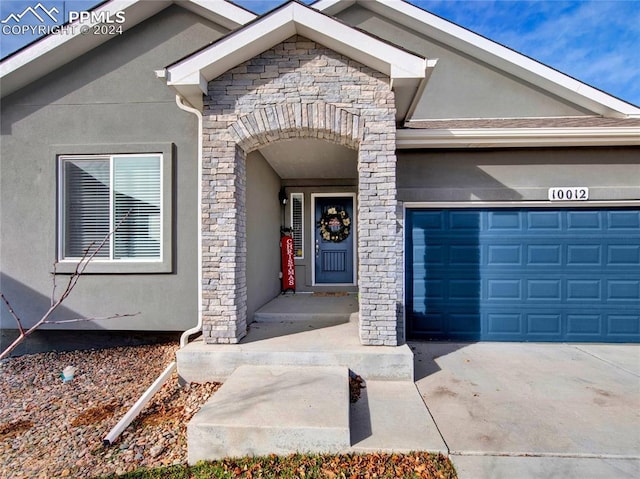 property entrance featuring a garage