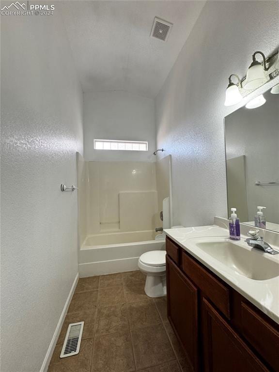 full bathroom featuring tile patterned flooring, vanity, toilet, and  shower combination