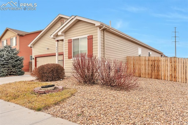 view of property exterior featuring a garage