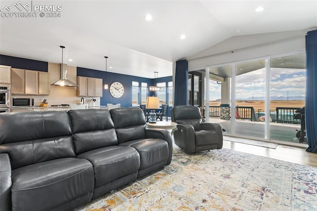 living room with lofted ceiling