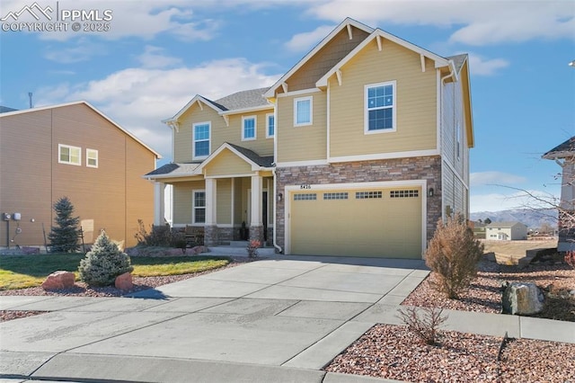 craftsman house featuring a garage