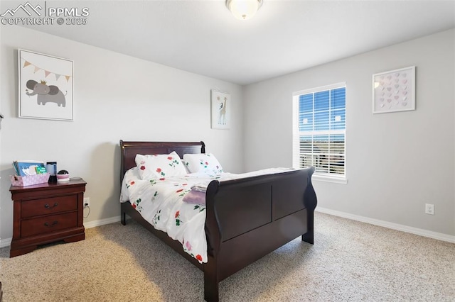 bedroom featuring light carpet