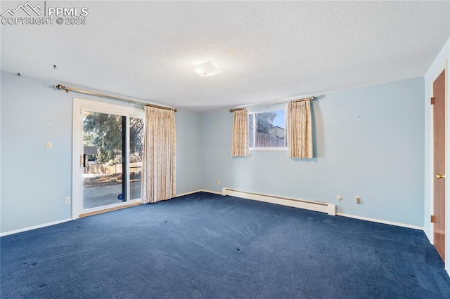 unfurnished room with dark carpet, a textured ceiling, and a baseboard heating unit