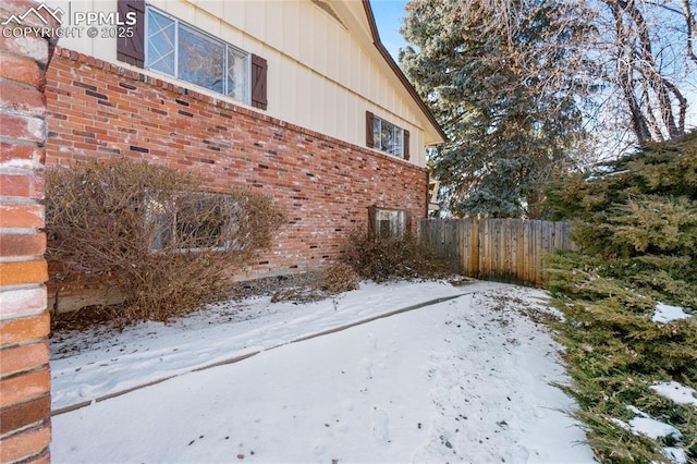 view of snow covered property